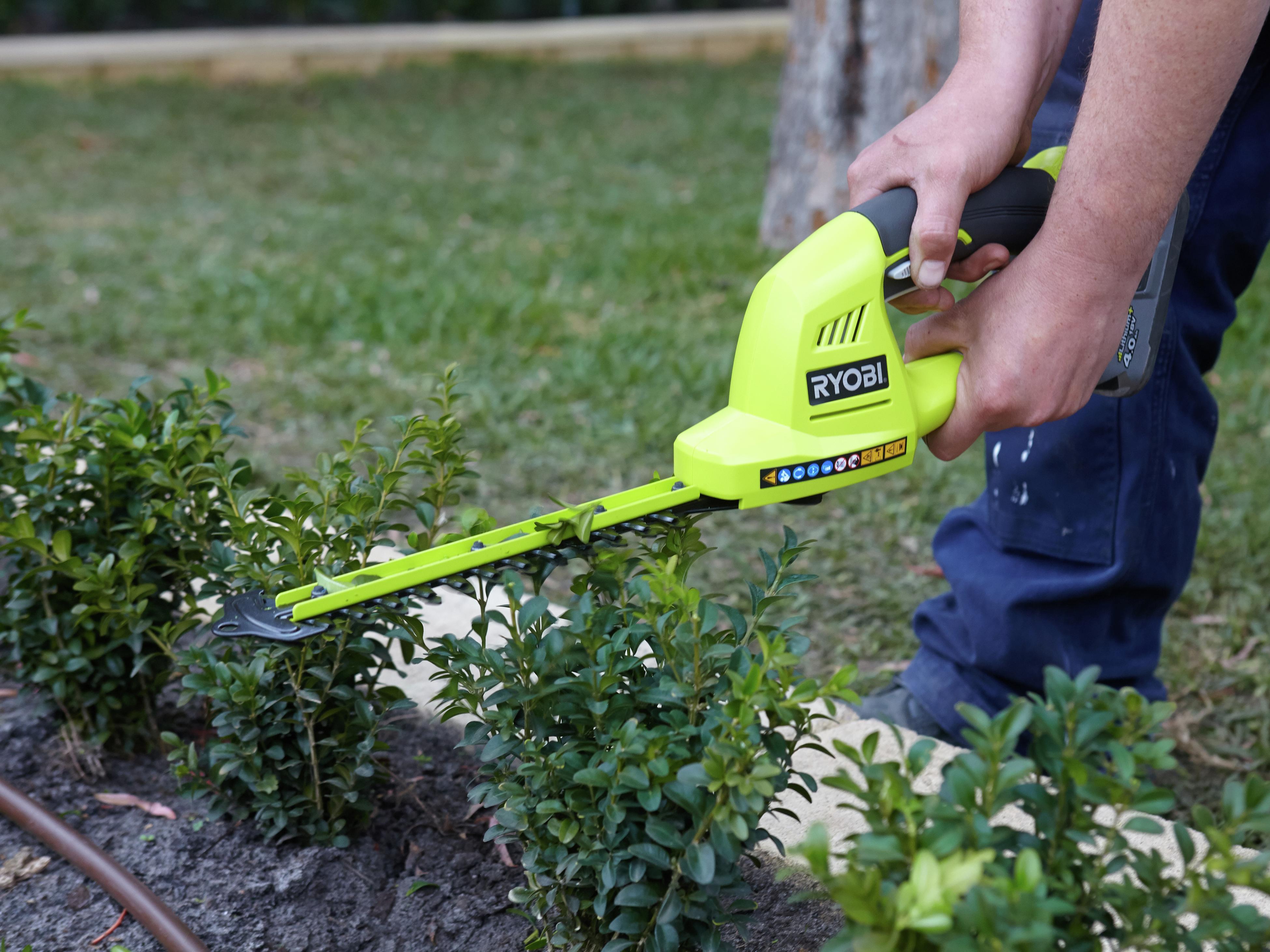 Bunnings ryobi cordless hedge trimmer hot sale