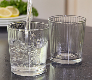 water going into glass