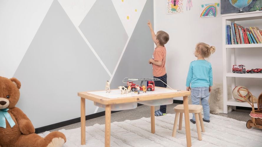 Feature
  wall created with the use of masking in kids play room. 