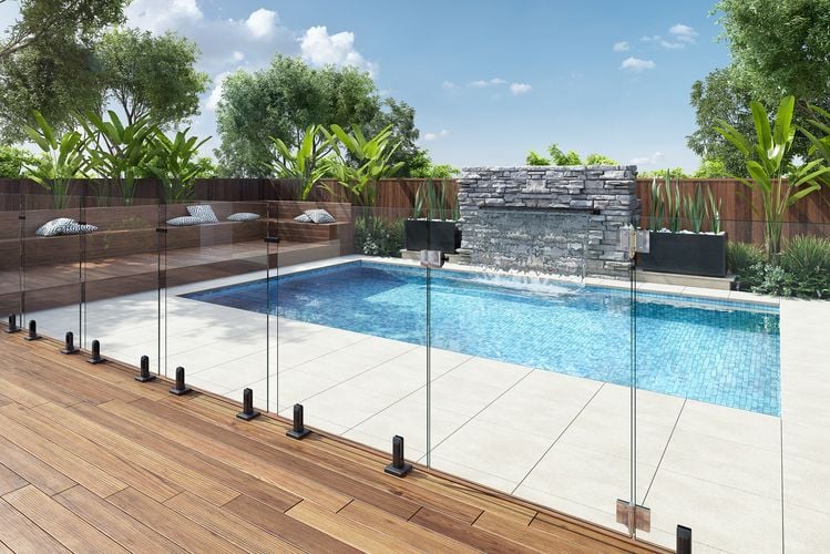 Pool fencing between a outdoor pool and a deck