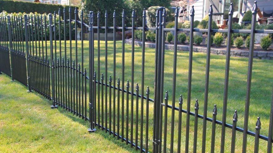 Steel fencing system on front yard. 