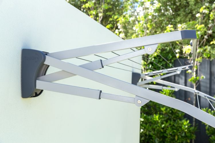 Wall mounted fold-up clothesline