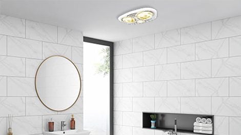 Extractor fan and light combo attached to bathroom ceiling