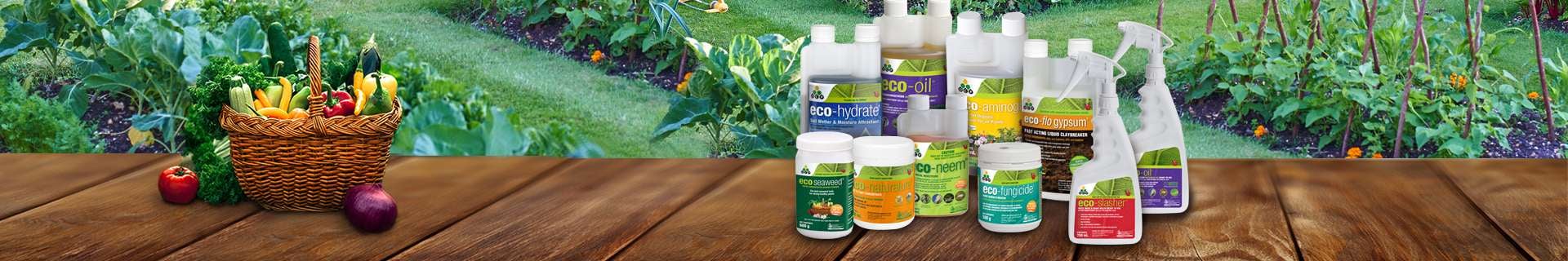 Garden with bottles of organic fertiliser and insecticides.
