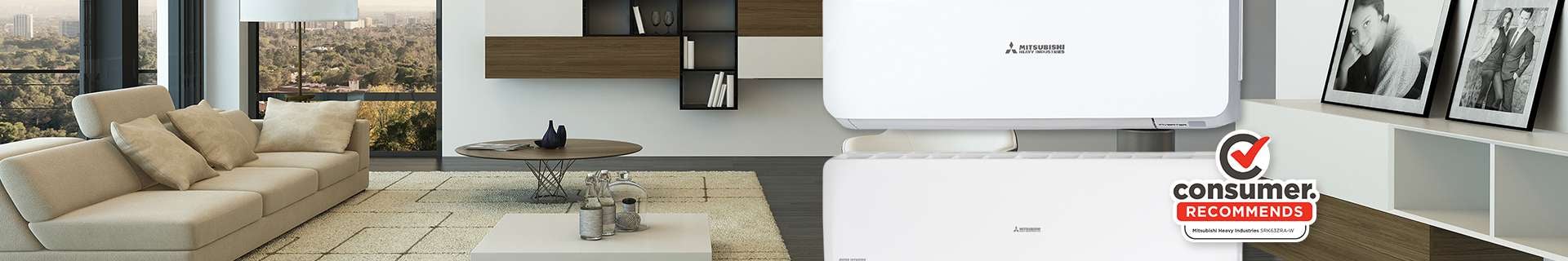 Lounge room with air conditioner and couch. Consumer recommends Mitsubishi Heavy Industries.