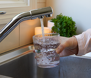water pouring from tap