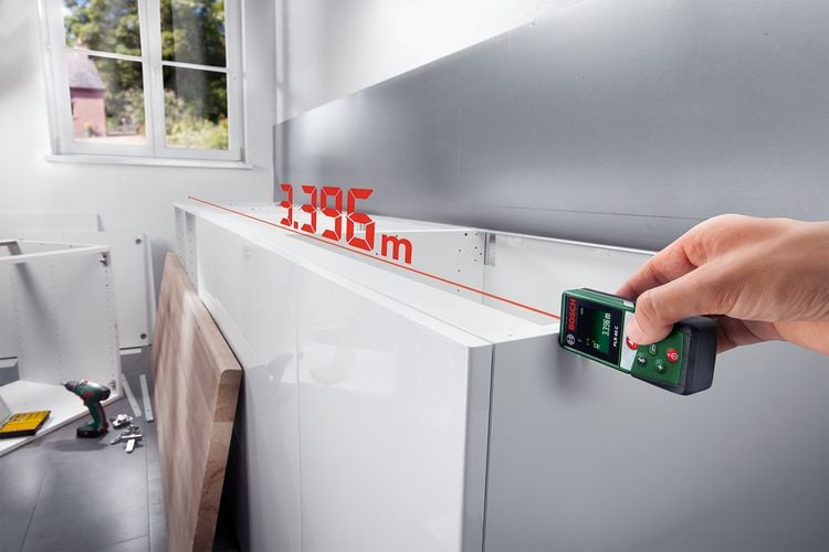 Digital rangefinder displaying length of bench