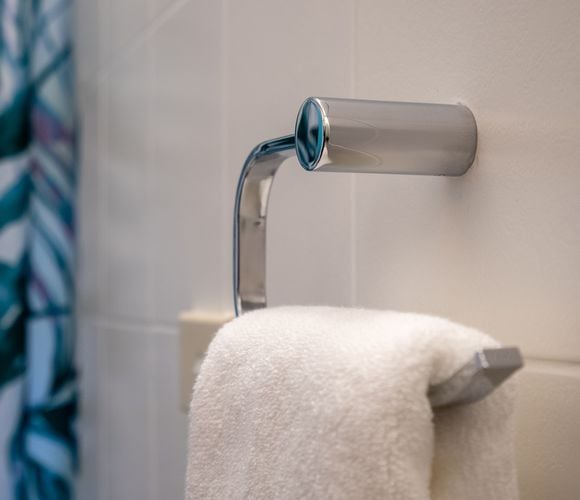 Hand towel hung in bathroom