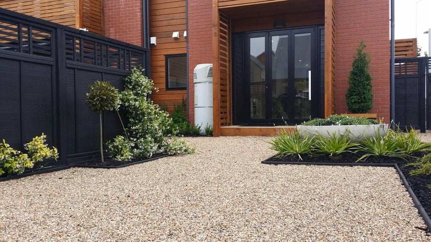 Backyard patio area with path grade installed
