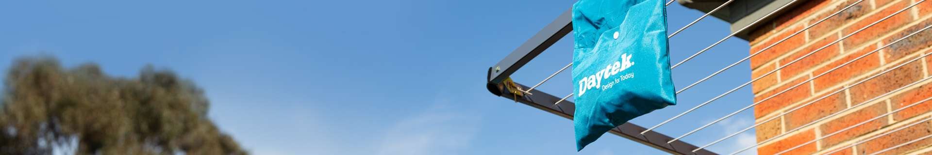 Clothesline with Daytek bag hanging.