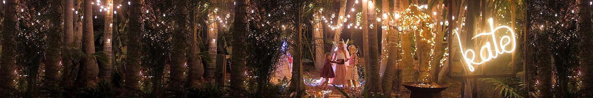 Warm white fairy lights in outdoor area.