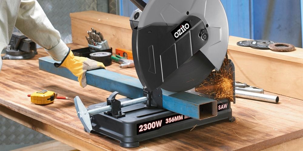 Ozito drop saw is used to cut a square steel tube