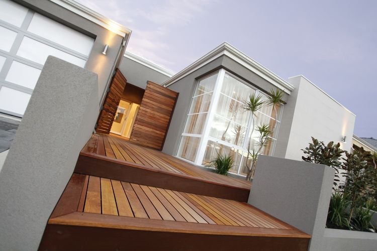 Entry to home with new timber decking staircase