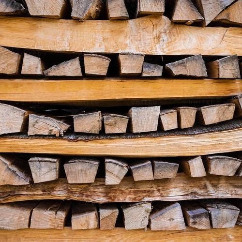 Stack of firewood stacked in cross hatching form