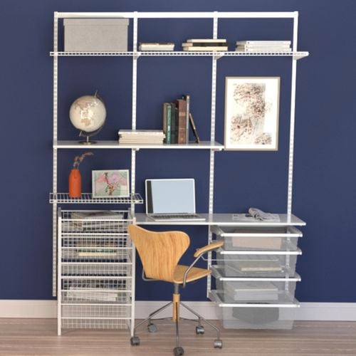 White open shelf in front of blue wall.