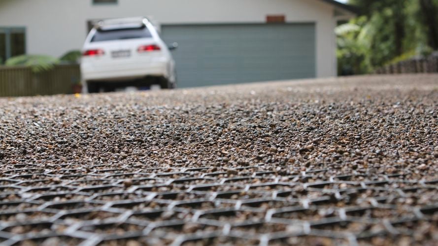 Close up of pebbled driveway with vehicle grade installed