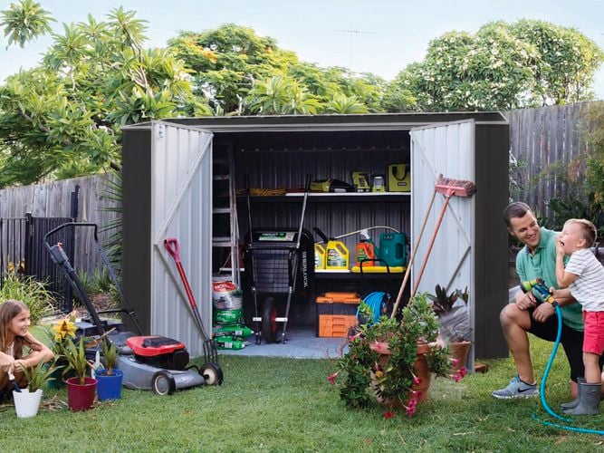 Nz Absco shed in backyard with tools in display