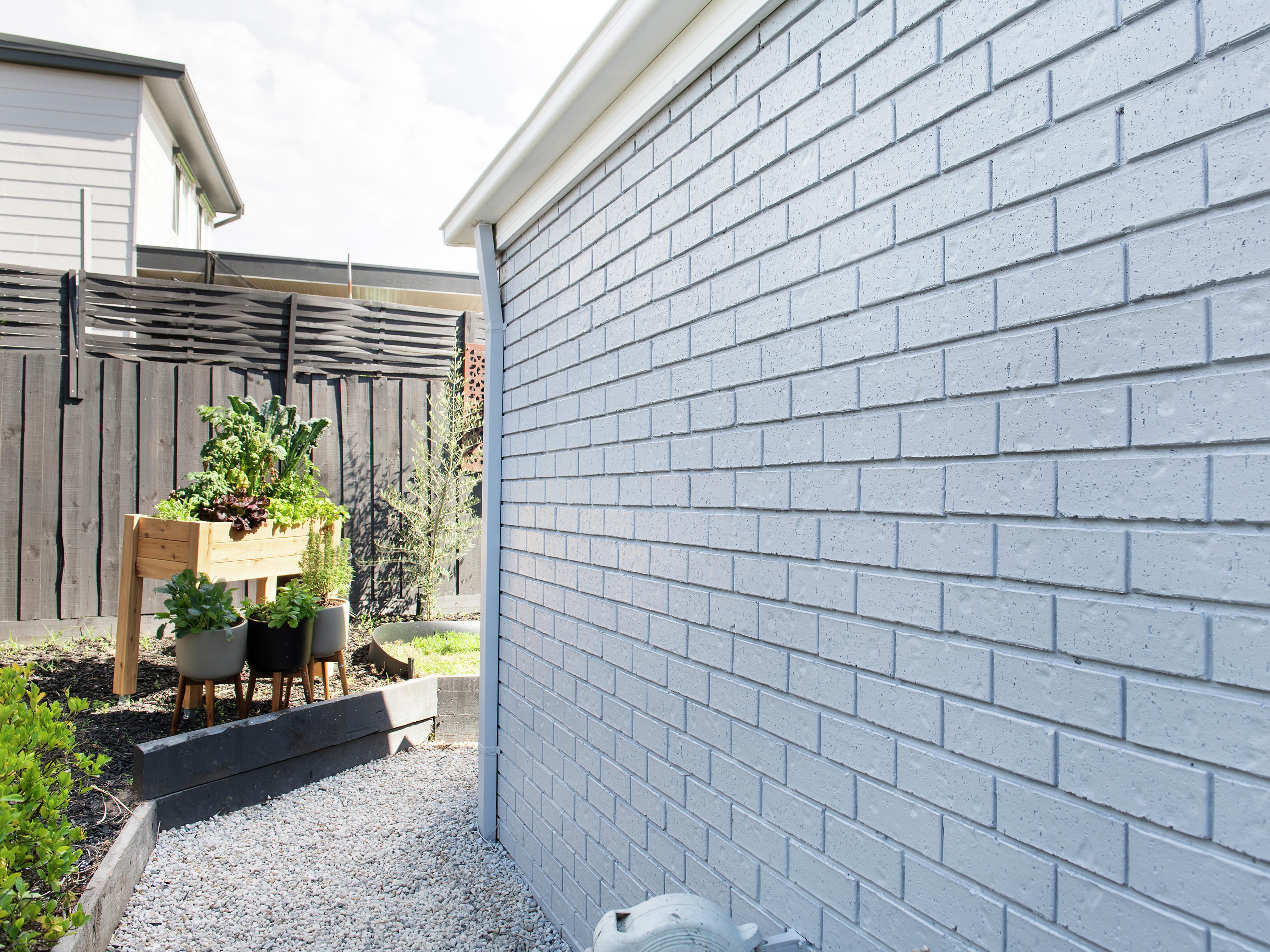 How To Spray Paint Your House's Exterior With An Airless Sprayer