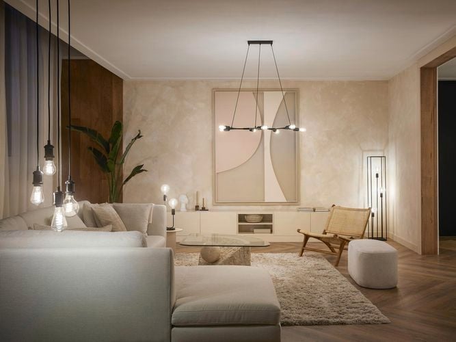 Living room, couch, stool and art work