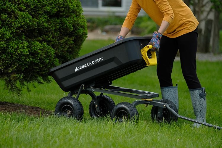 Person detaching cart box from cart