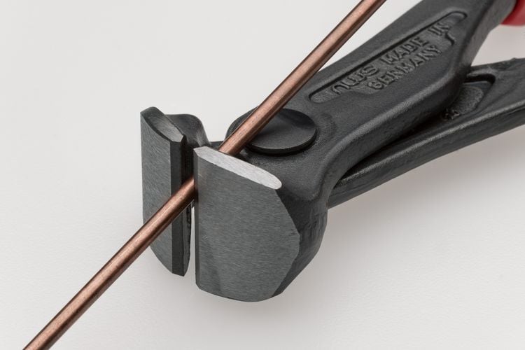 End cutting nippers being used to cut metal