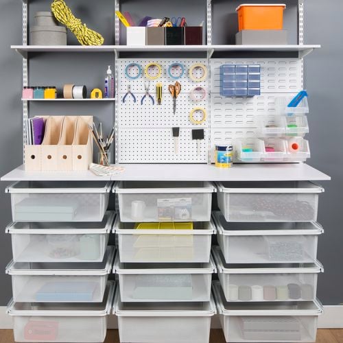 Office supplies on shelf.