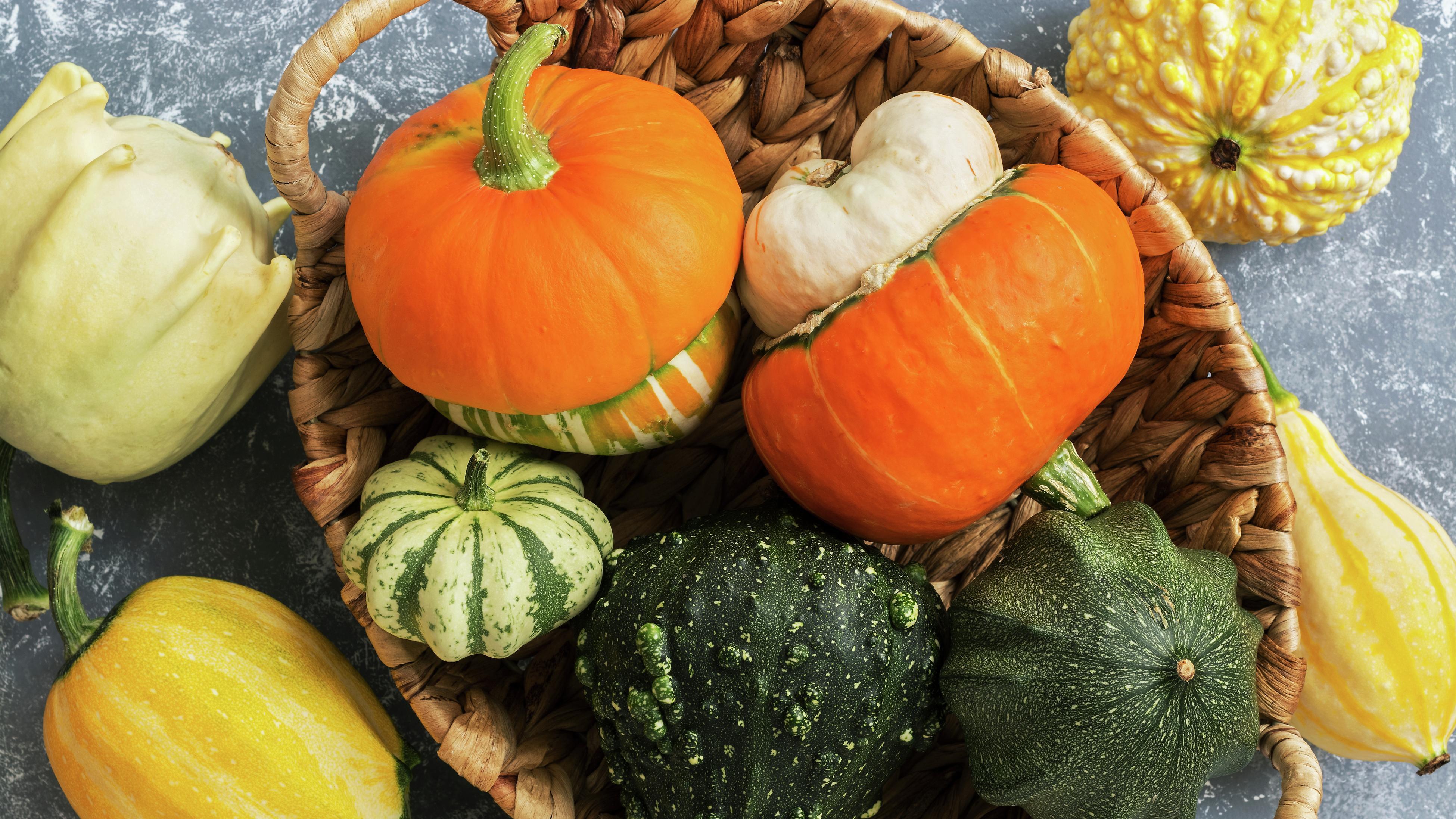 A variety of squash in a basket