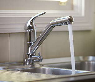 water pouring from tap