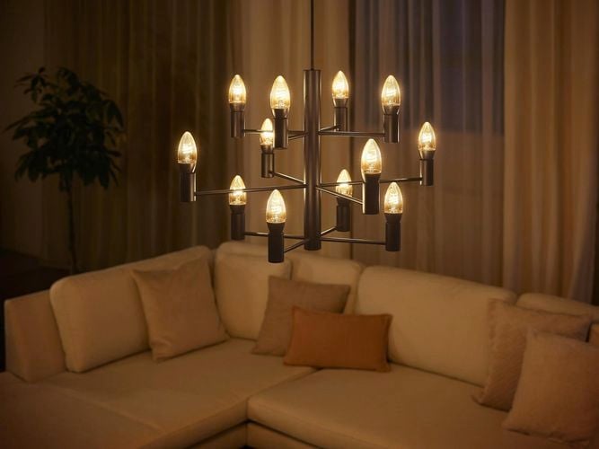 Living room with corner couch and pendent light