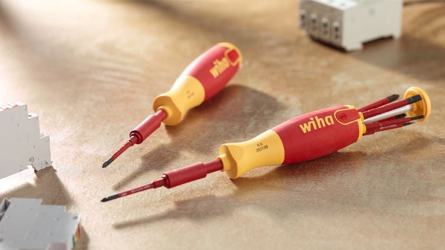 two wiha screw drivers with interchangeable bits. The bits are stored in the grip handle.