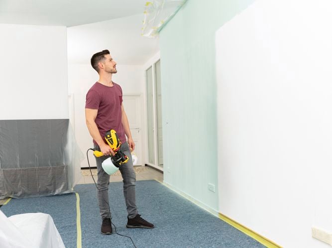 Wagner
  Flexio W590 with i-Spray attachment to spray teal onto a wall