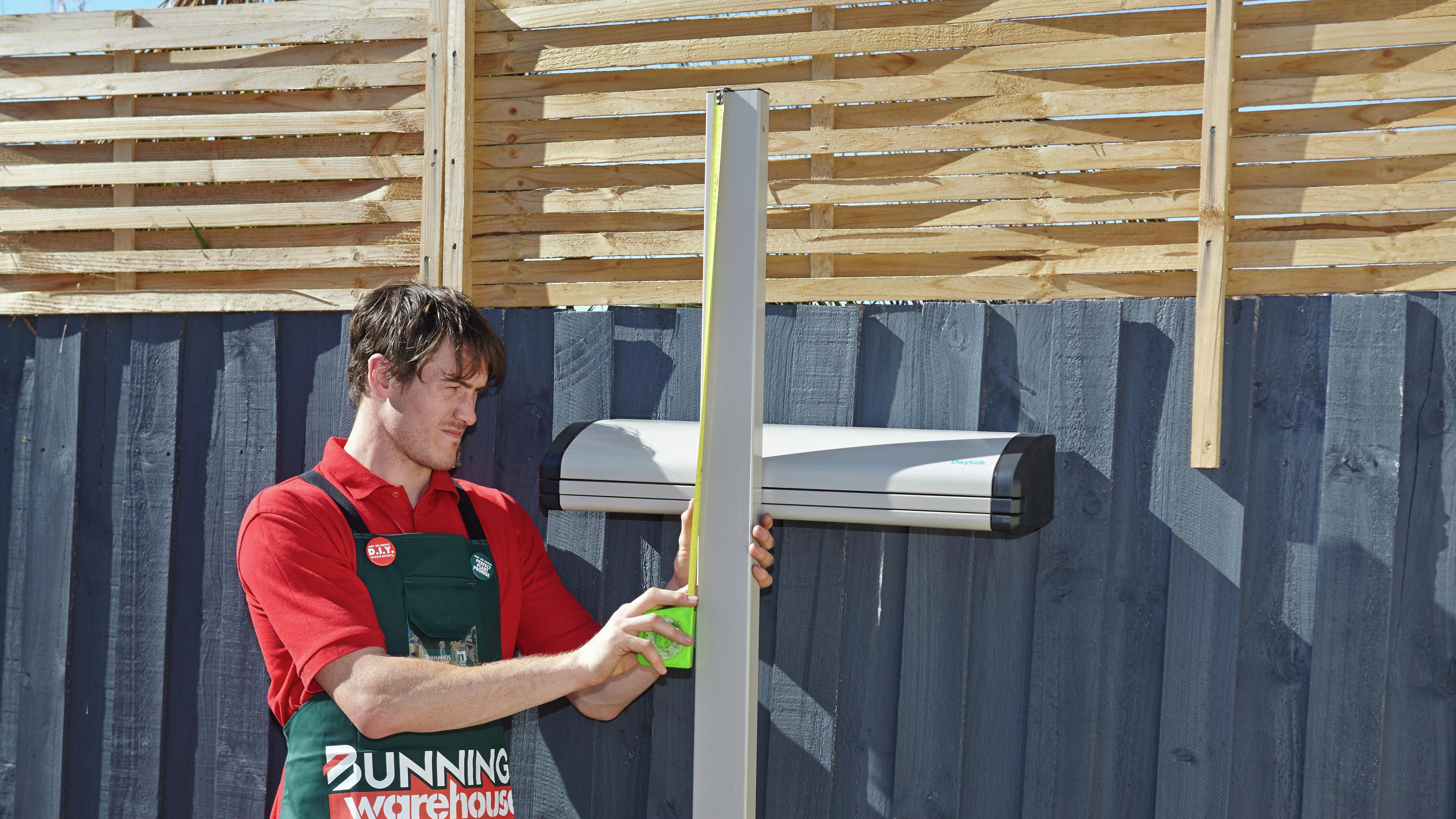 How To Install a Retractable Clothesline - Bunnings Australia