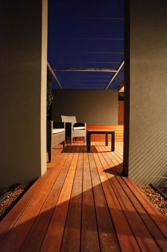 Outdoor timber decking space with outdoor lounge area 