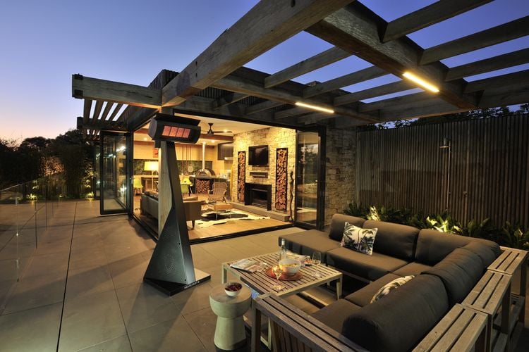 Outdoor entertaining area with lounge and outdoor heaters
