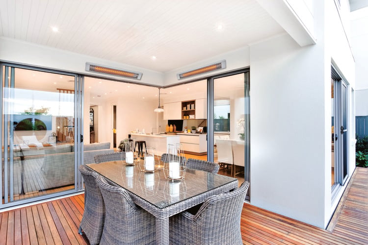 Covered outdoor timber decking area with outdoor heaters