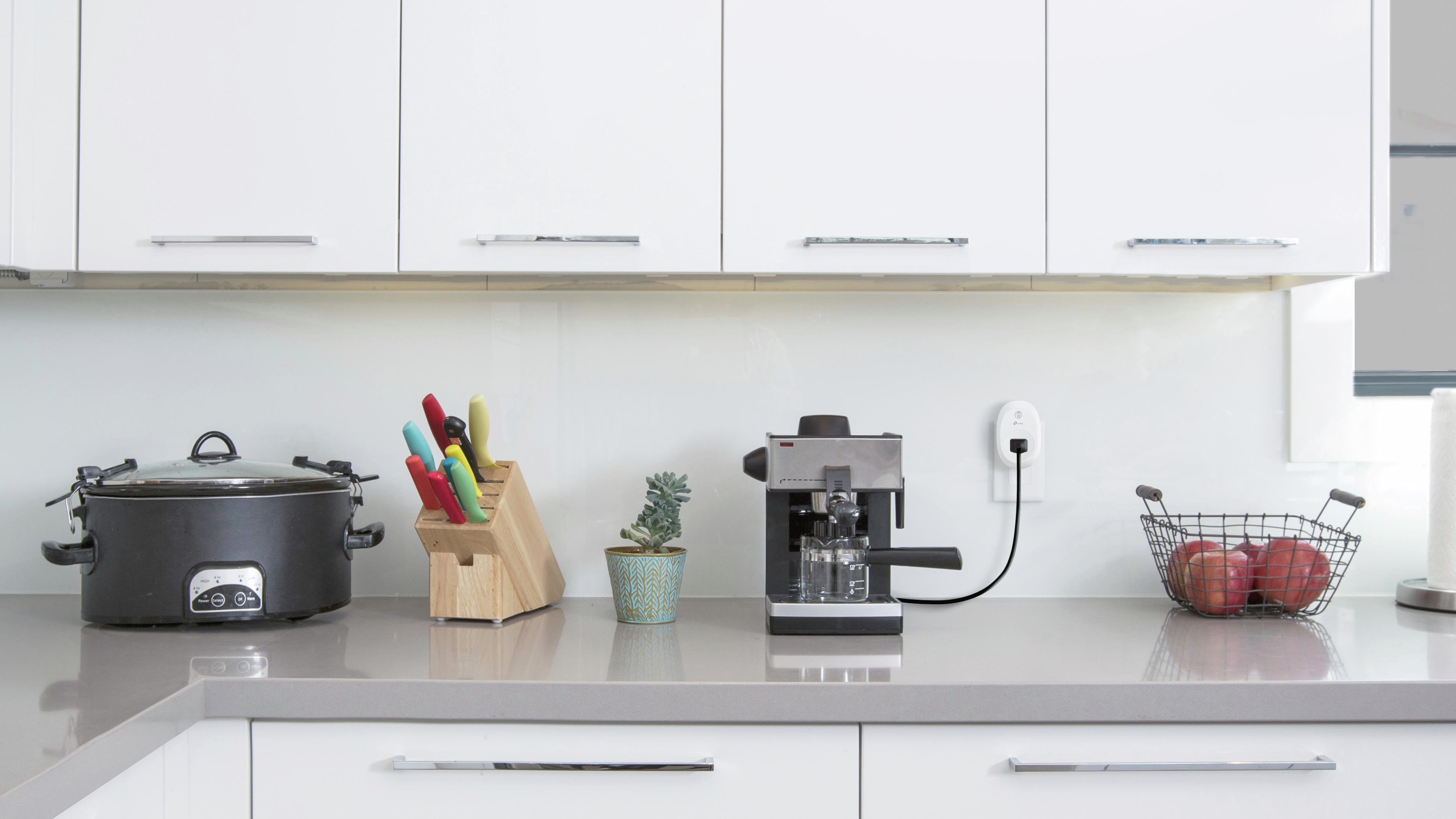 Kitchen benchtop space featuring countertop appliances connected to a smart plug
