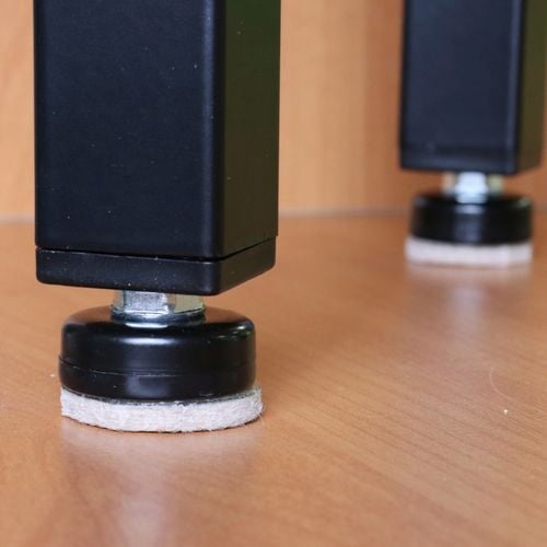 Legs under table with felt