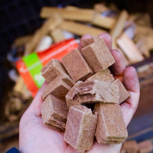 Person holding a handful of firestarters