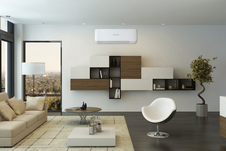 Lounge room with beige lounge, floating wall storage unit, beige rug and air conditioning unit