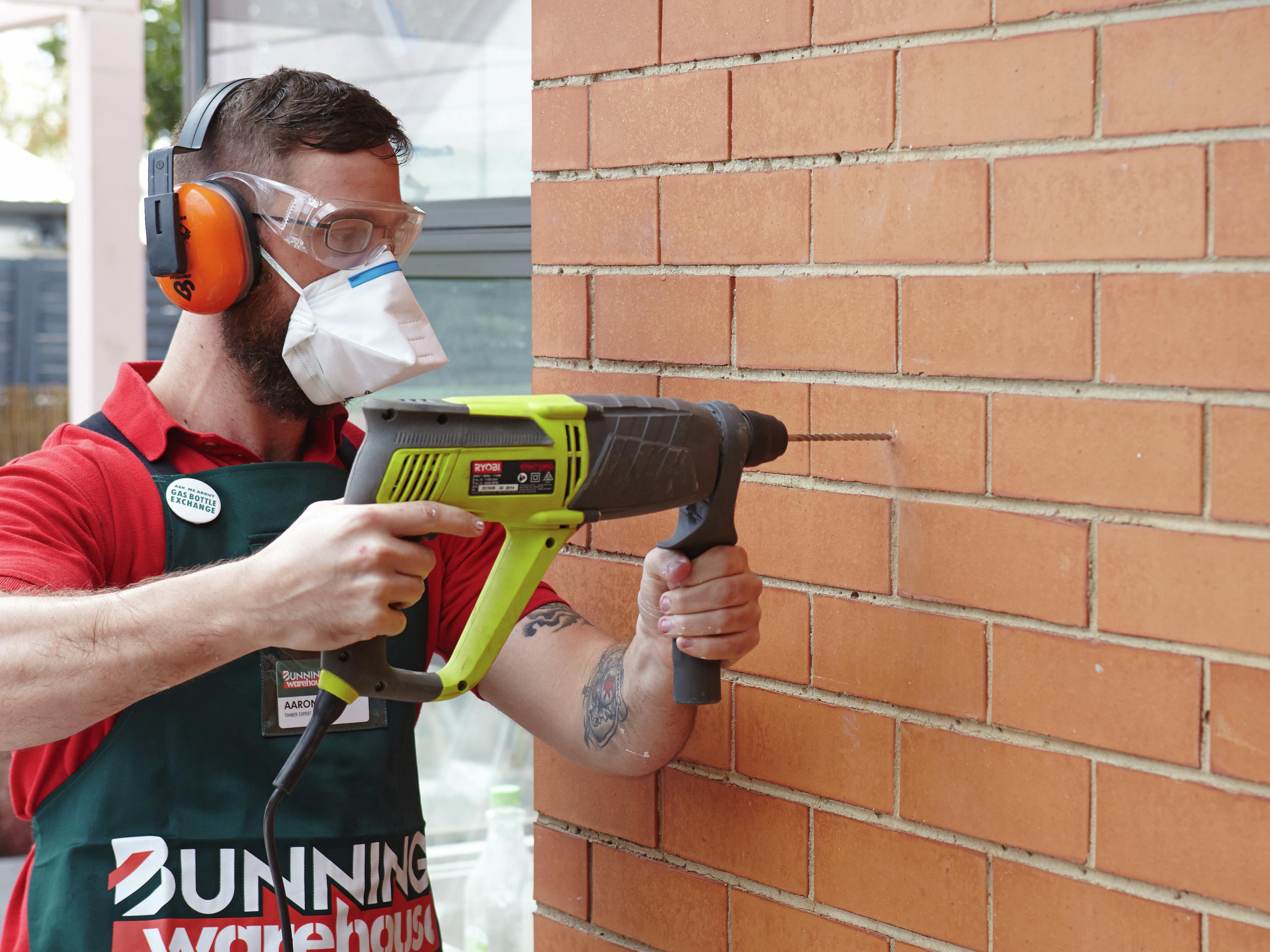 How to drill a hole in brick without deals a hammer drill