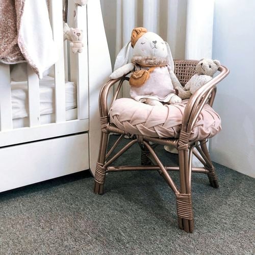 A chair with a coat of spray - Rust-Oleum 2X Ultra Cover Spray Gloss Rose Gold.
