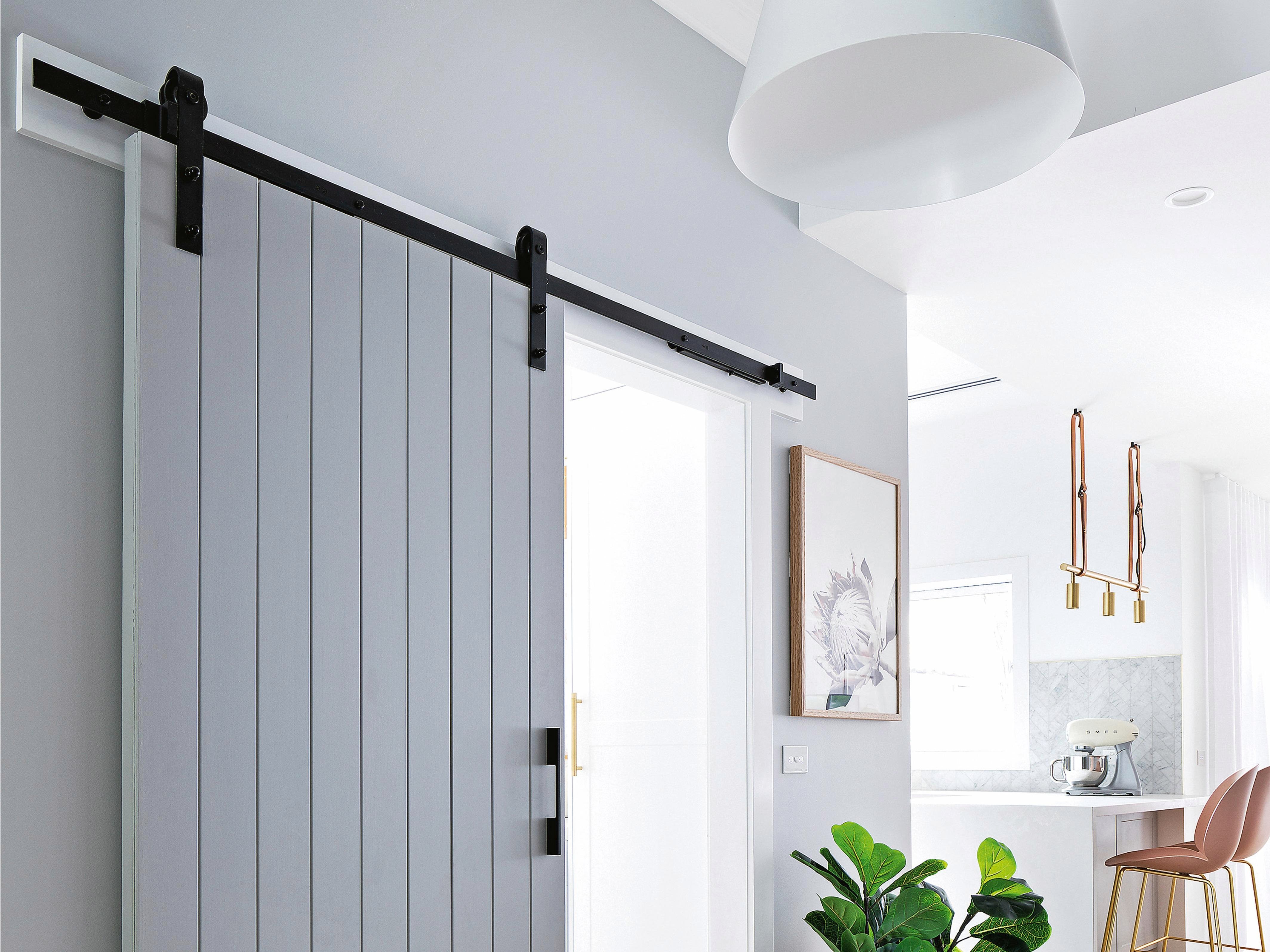 Are barn doors still in style? Interior designers weigh in on the well-loved rustic feature