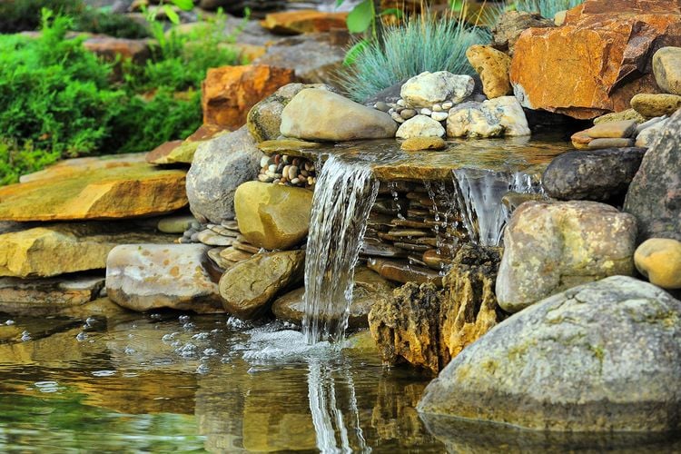 Small stone-lined waterfall