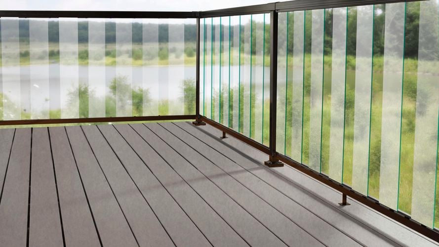 Black balustrade system with clear sectional panels.