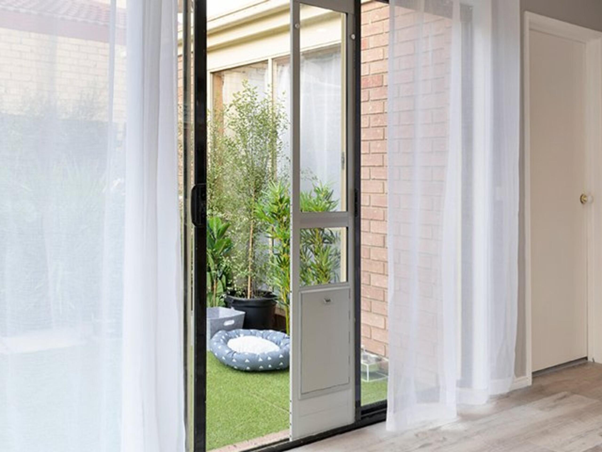 Pet door for outlet patio and sliding doors