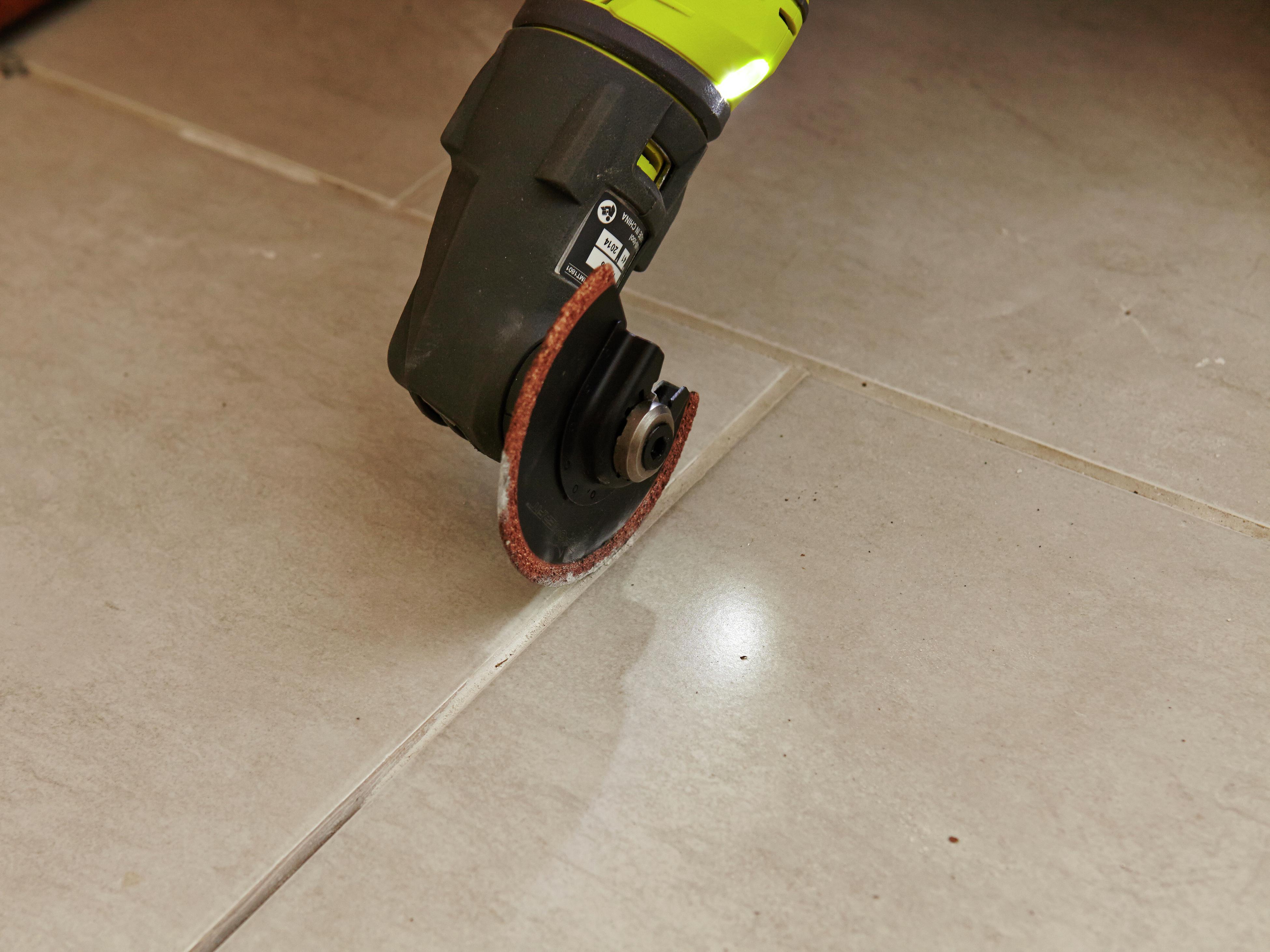 Removing floor tile on sale with oscillating tool