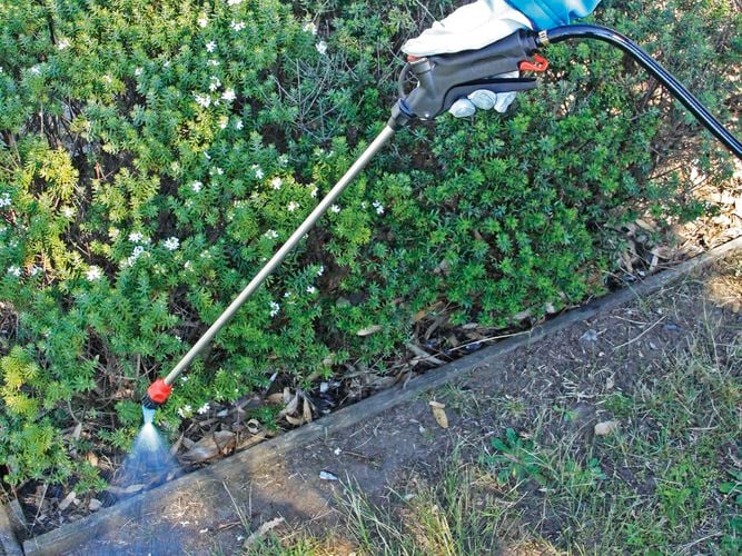 Silvan sprayer attachment in use