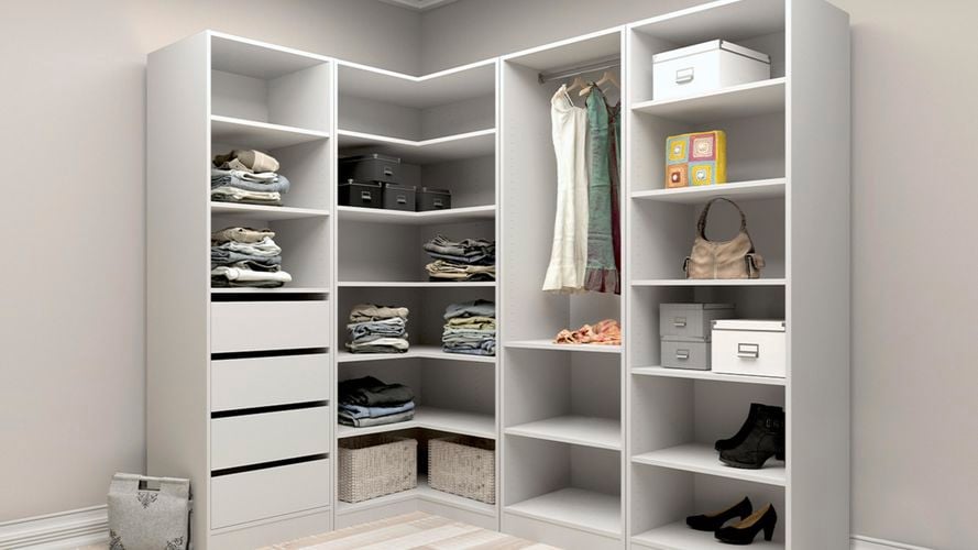 Organised L shape walk in wardrobe.