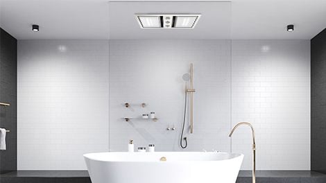 Extractor fan and light combo attached to bathroom ceiling